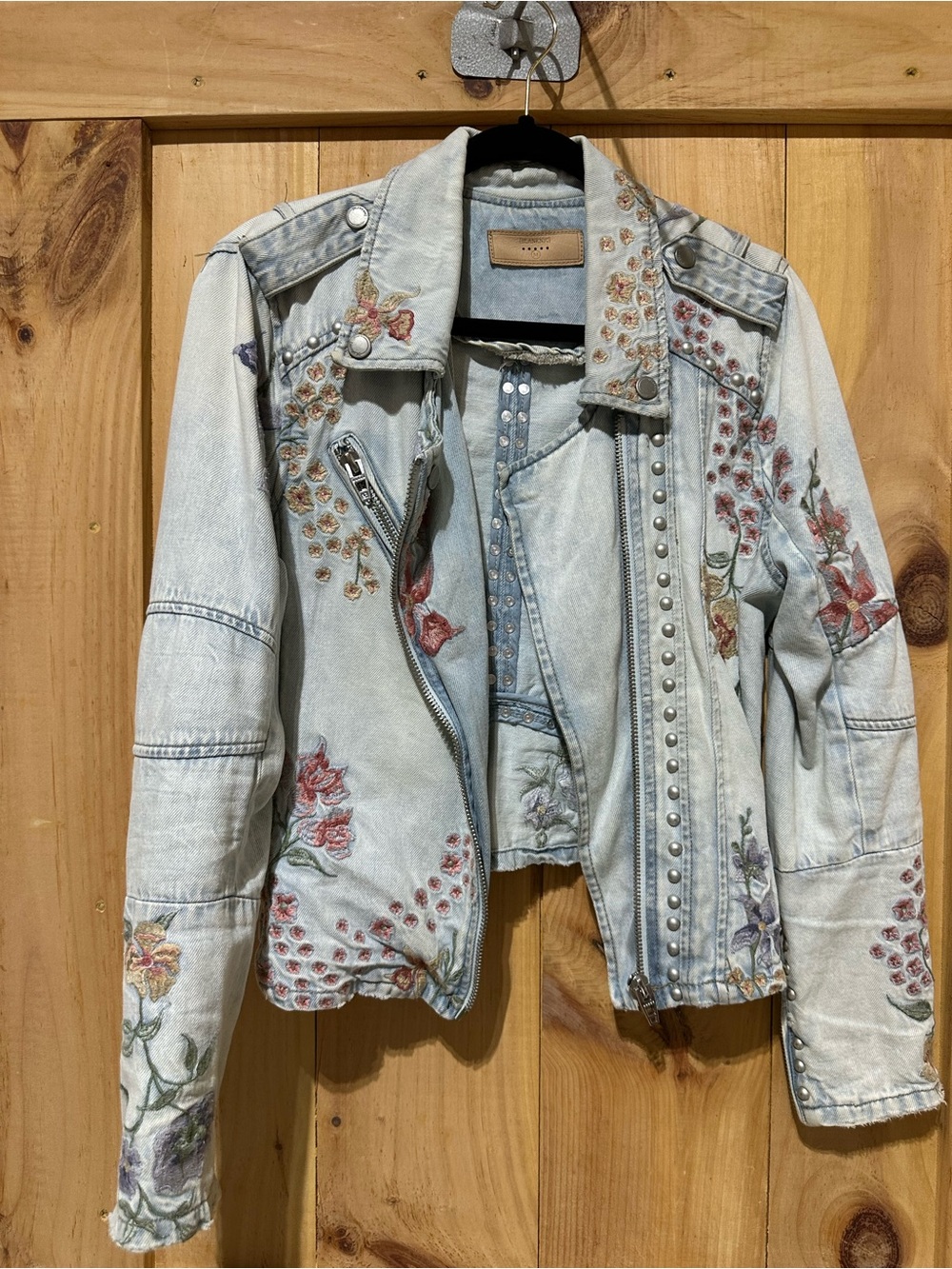 Blank NYC Light Wash Denim Jacket with Floral Embroidery & Studs
